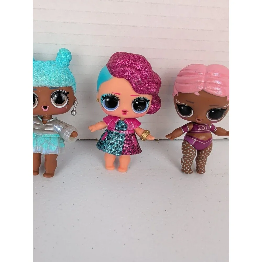 Lot of 8 LOL Surprise Dolls And Pet